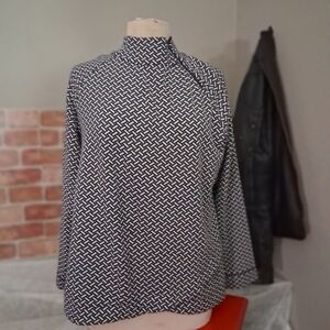 Chic Black and White Patterned Blouse